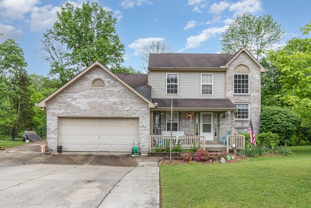 front of property with a porch, a garage, and a front lawn