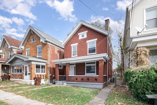 view of front of property with a front lawn