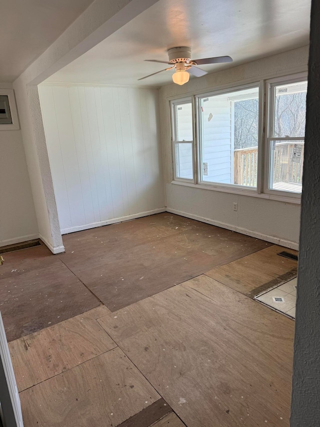 spare room with ceiling fan