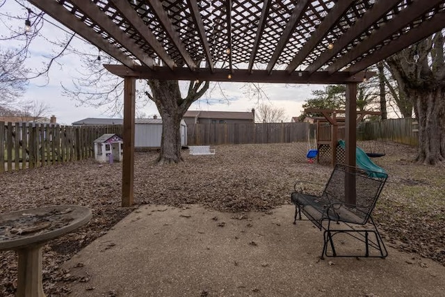 view of yard featuring a fenced backyard and a playground