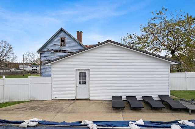 rear view of house with a patio