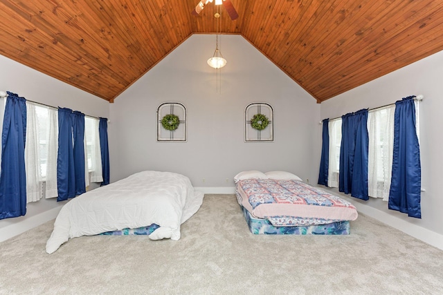 bedroom with carpet, lofted ceiling, and wood ceiling