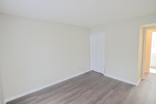 empty room featuring hardwood / wood-style floors