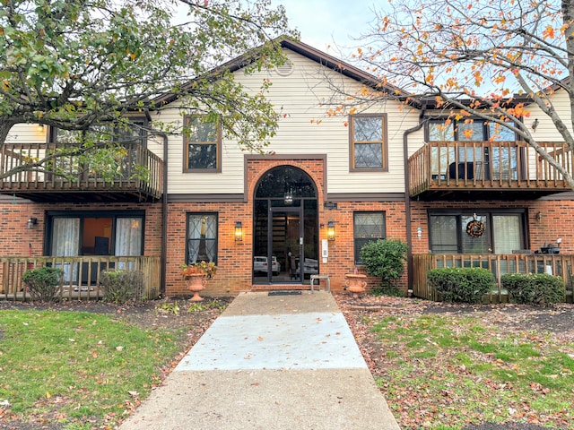 view of property with a balcony