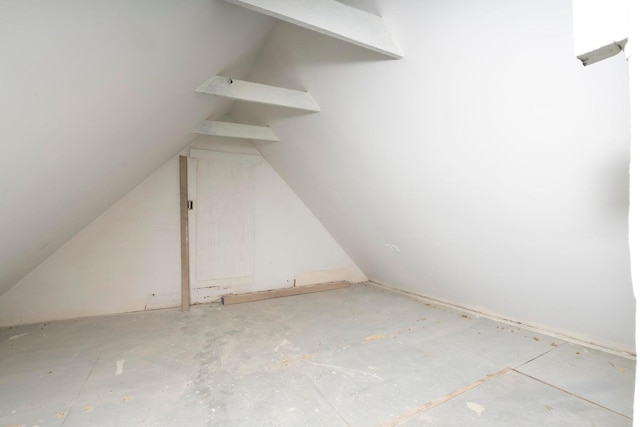 additional living space with lofted ceiling