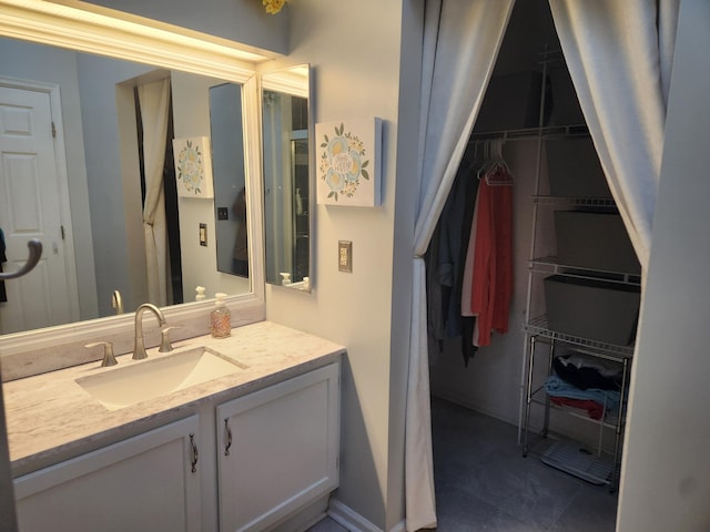 bathroom featuring vanity and tile patterned floors