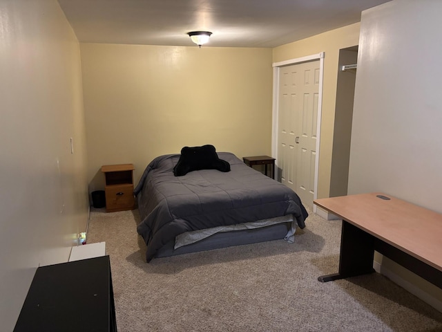 bedroom featuring a closet and carpet