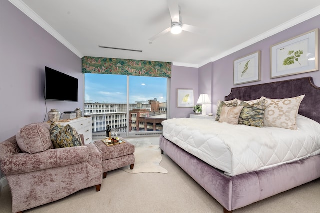 bedroom featuring ceiling fan, light colored carpet, crown molding, and access to outside