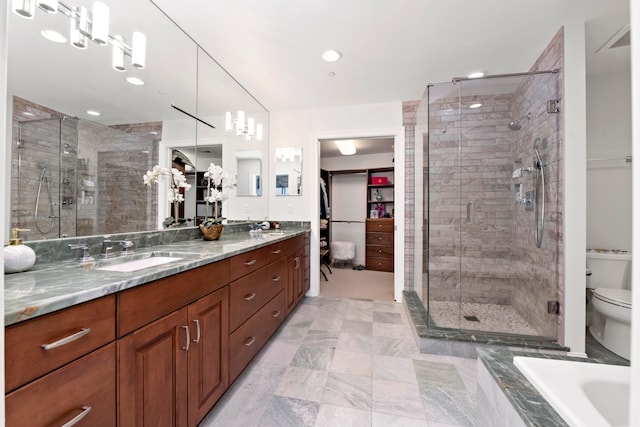 full bathroom with vanity, independent shower and bath, and toilet