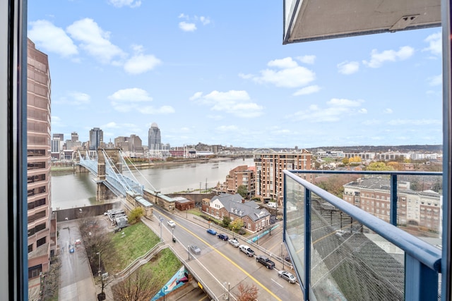 balcony featuring a water view