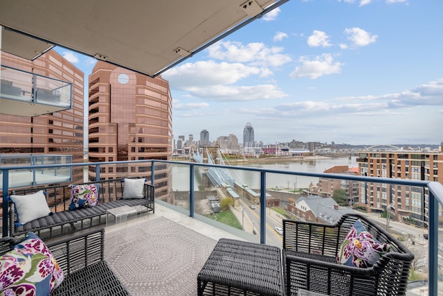 balcony featuring a water view