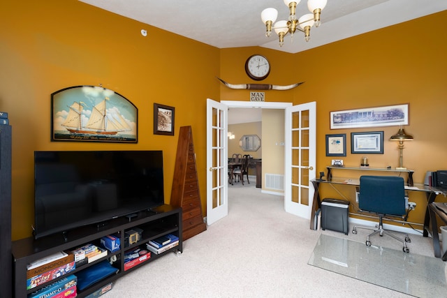 office area featuring french doors and an inviting chandelier