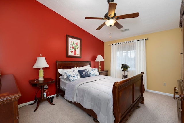 carpeted bedroom featuring vaulted ceiling and ceiling fan