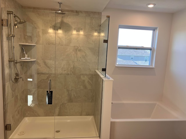 bathroom with independent shower and bath