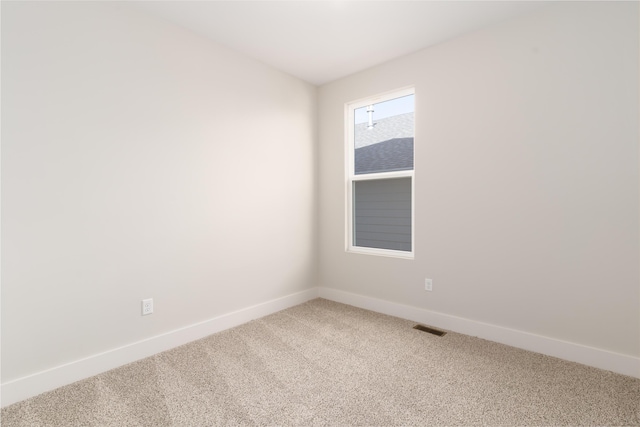 spare room with carpet flooring