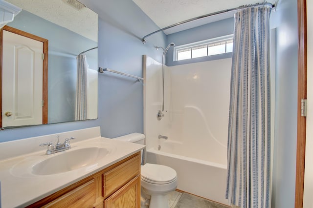 bathroom with a textured ceiling, toilet, vanity, visible vents, and shower / bath combination with curtain