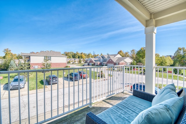 balcony featuring a residential view