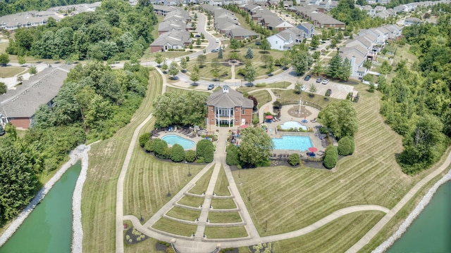 bird's eye view with a water view and a residential view