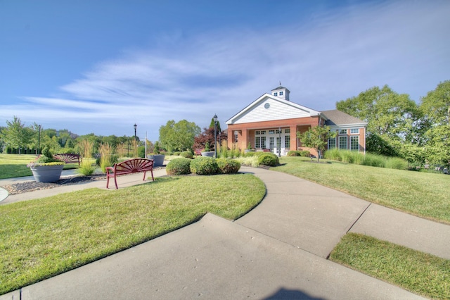 view of front of home featuring a front lawn