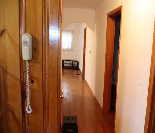 corridor featuring hardwood / wood-style flooring