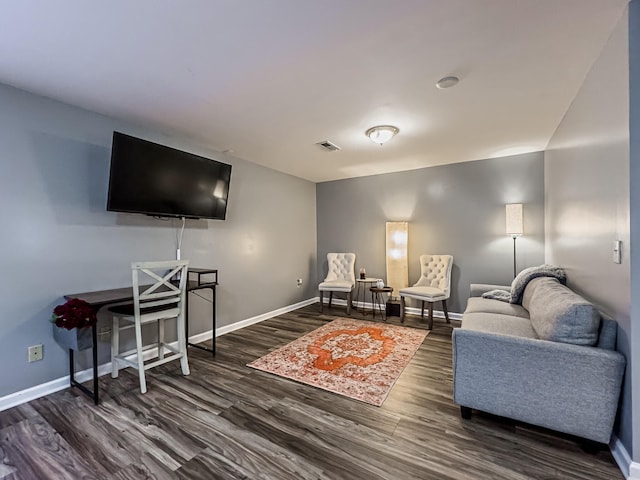 living room with dark wood-type flooring