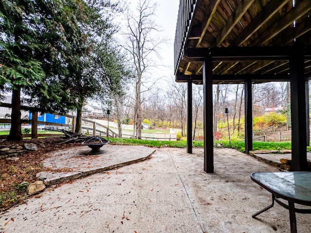 view of patio / terrace featuring a fire pit