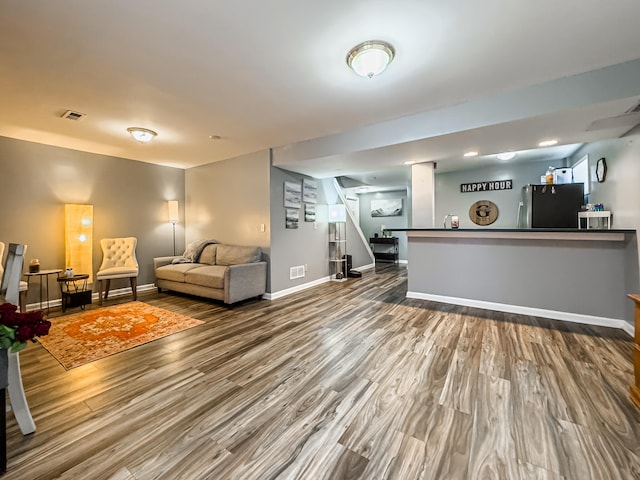 living room with hardwood / wood-style floors