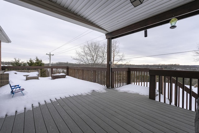 view of snow covered deck