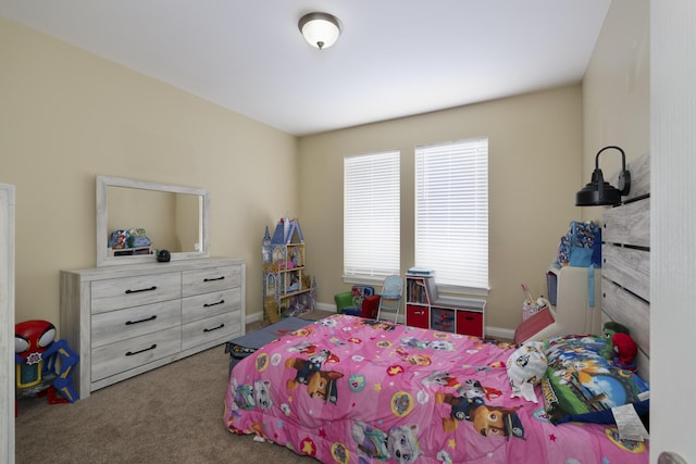 bedroom featuring carpet and multiple windows