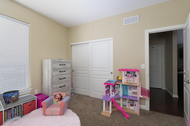 game room with carpet flooring, baseboards, and visible vents