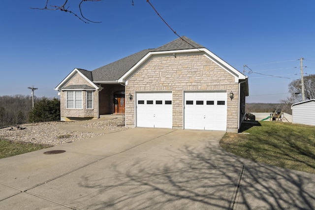 view of front of house with concrete driveway, an attached garage, stone siding, and roof with shingles