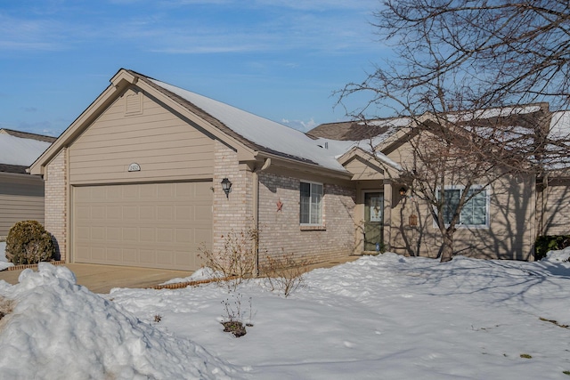 single story home with a garage