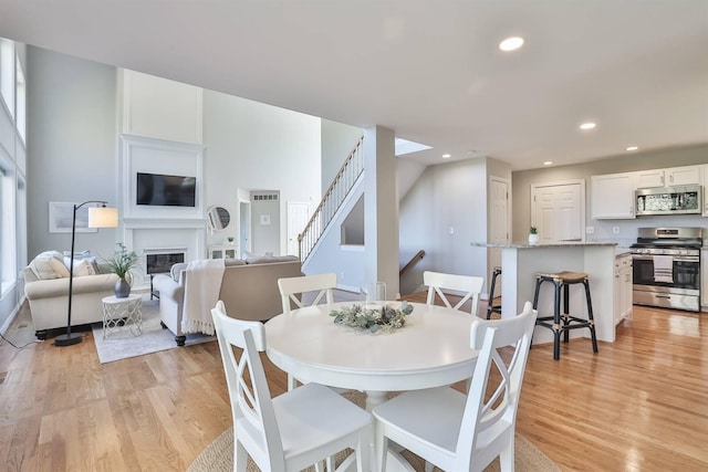 dining space featuring light hardwood / wood-style floors