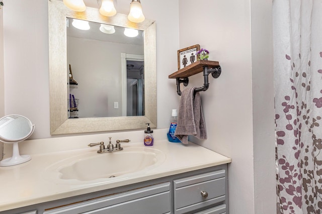 bathroom featuring vanity and a shower with curtain