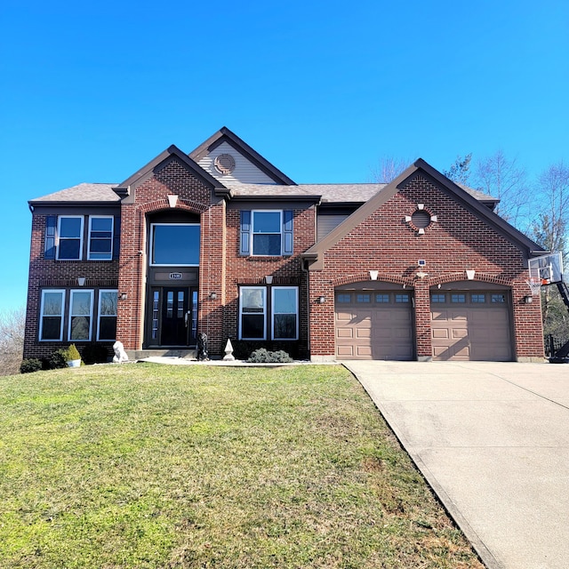 view of front of property with driveway, a front lawn, an attached garage, and brick siding