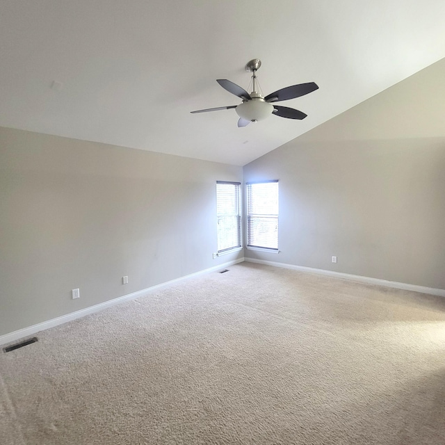 unfurnished room with light colored carpet, visible vents, and baseboards