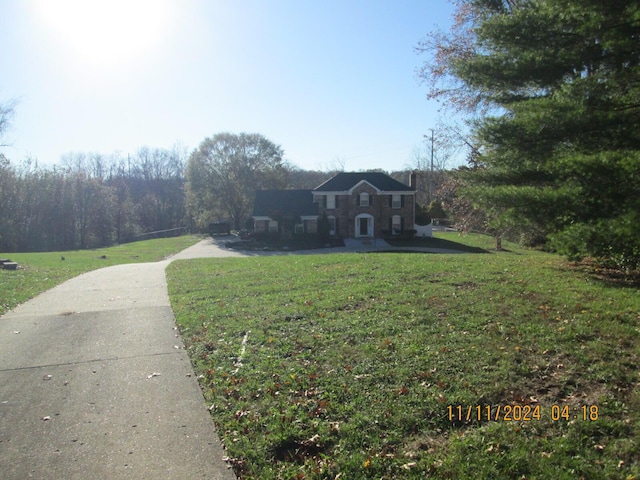 view of front of home with a front lawn