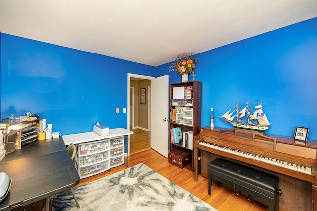 miscellaneous room featuring hardwood / wood-style flooring