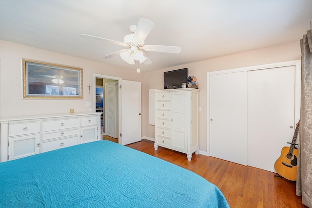 bedroom featuring dark hardwood / wood-style floors and ceiling fan