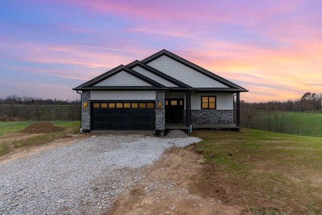 view of front of property with a garage