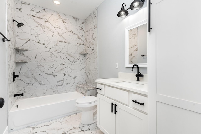 full bathroom featuring toilet, vanity, and tiled shower / bath combo