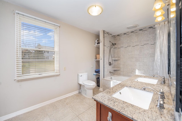 full bathroom featuring tile patterned flooring, shower / bath combo, toilet, and vanity