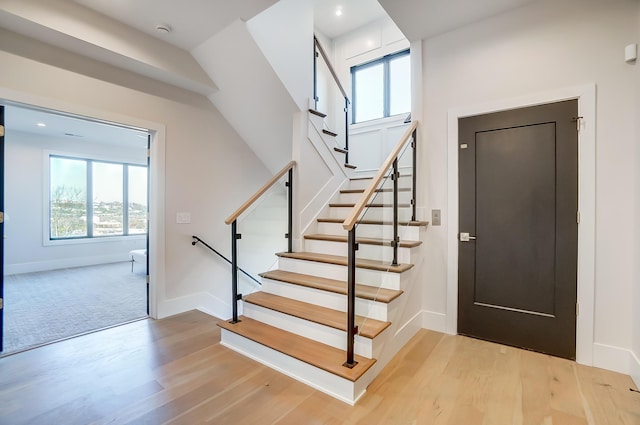 entryway with light hardwood / wood-style flooring