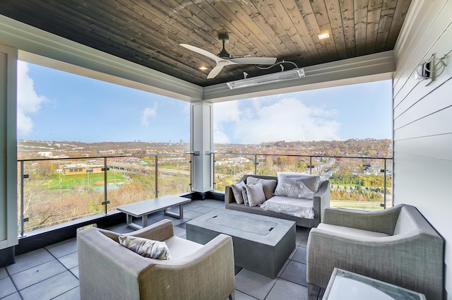 view of patio with ceiling fan and an outdoor hangout area