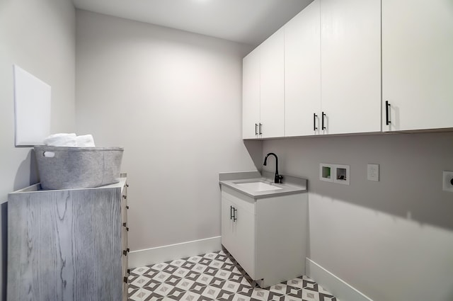 laundry area featuring washer hookup, electric dryer hookup, cabinets, and sink