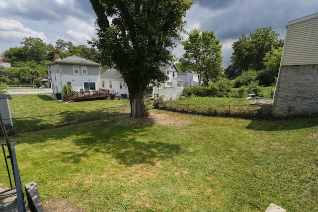 view of yard featuring a wooden deck