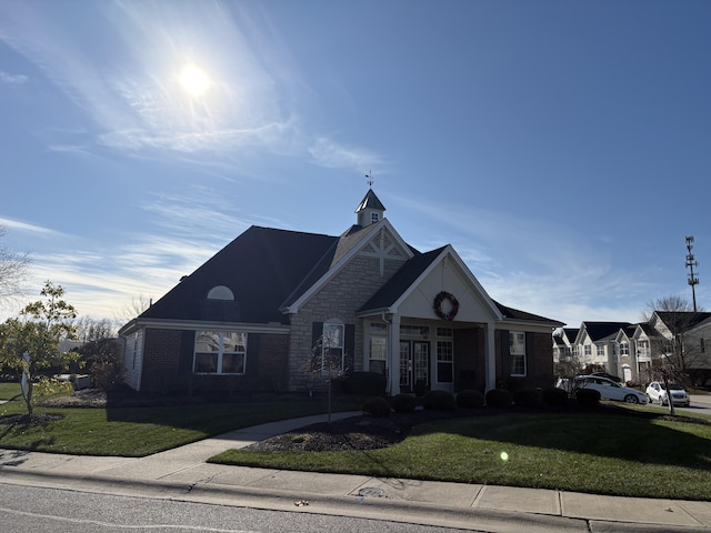 view of front of home with a front yard