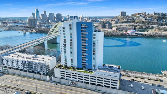 birds eye view of property with a water view