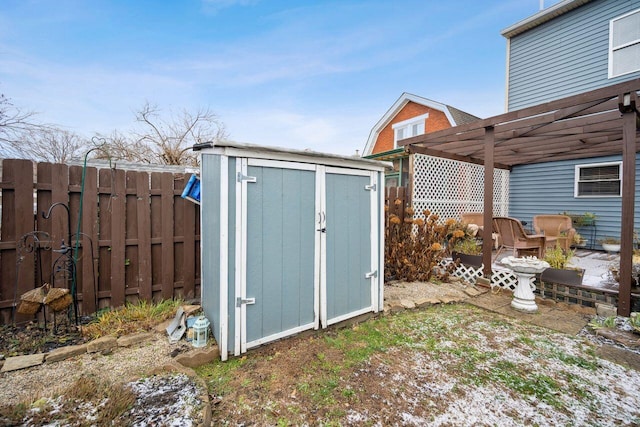 view of outbuilding with a pergola