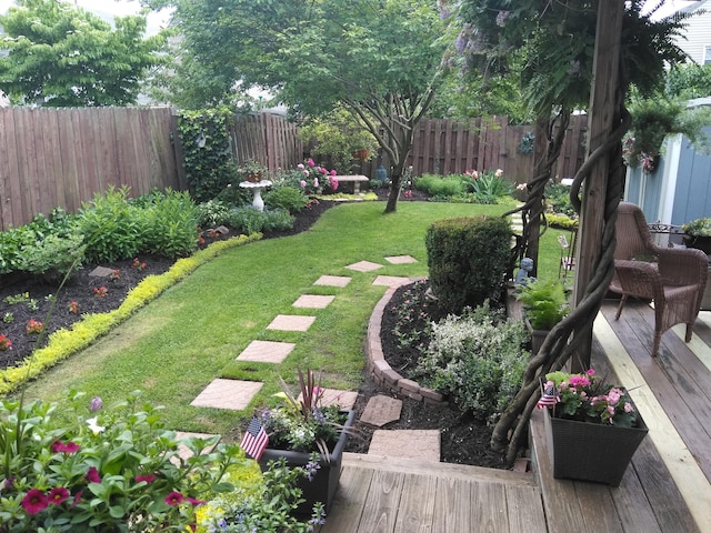 view of yard featuring a deck